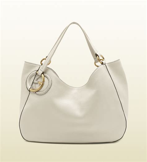 white gucci purse long strap canvis|Gucci handbags.